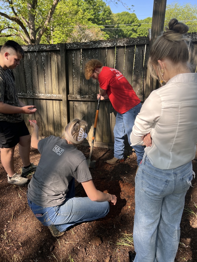 Planting with FFA students