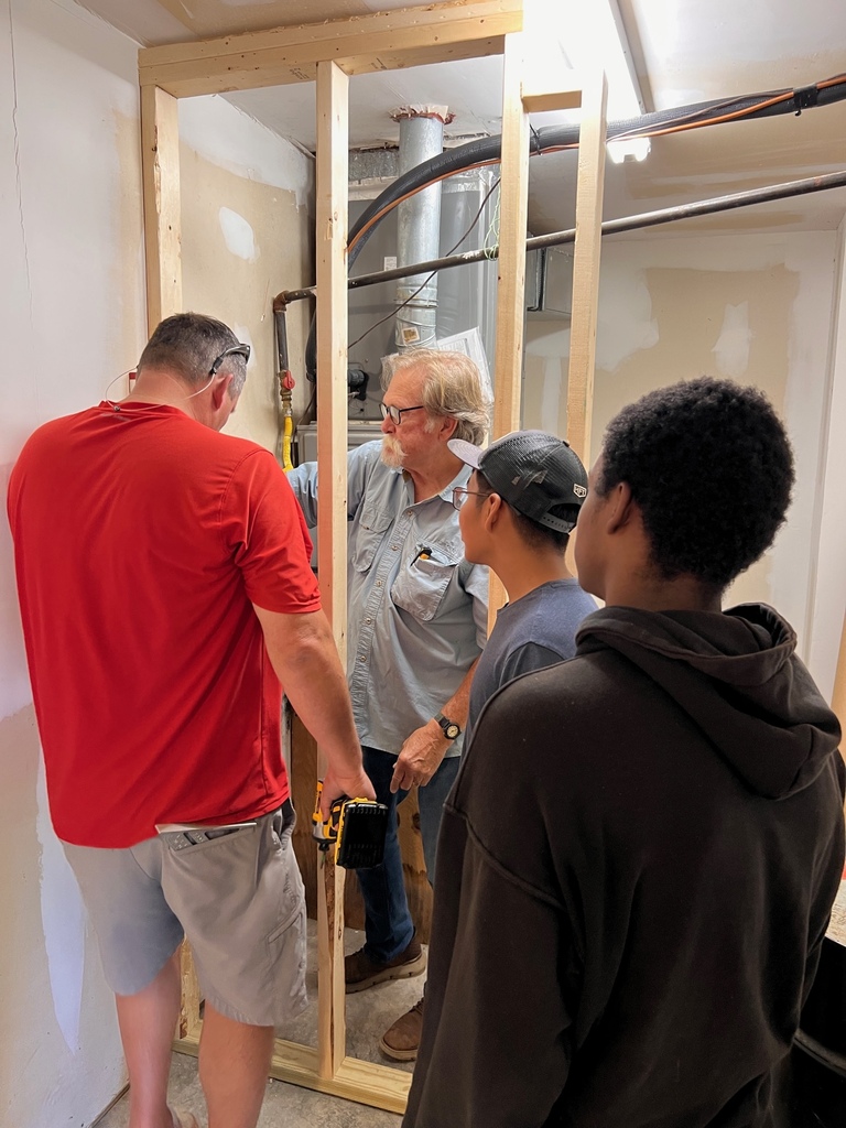 Kamahri and Roony working with Mr. Stan Junkin and Coach Nix