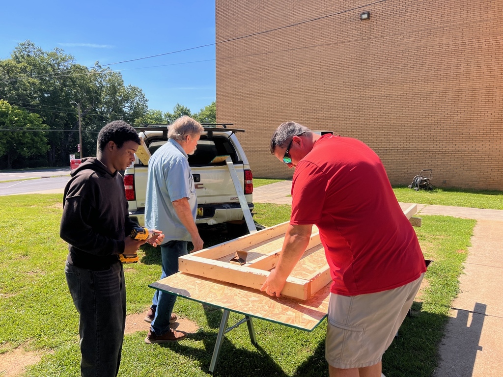 Kamahri learning with Mr. Stan Junkin and Coach Nix