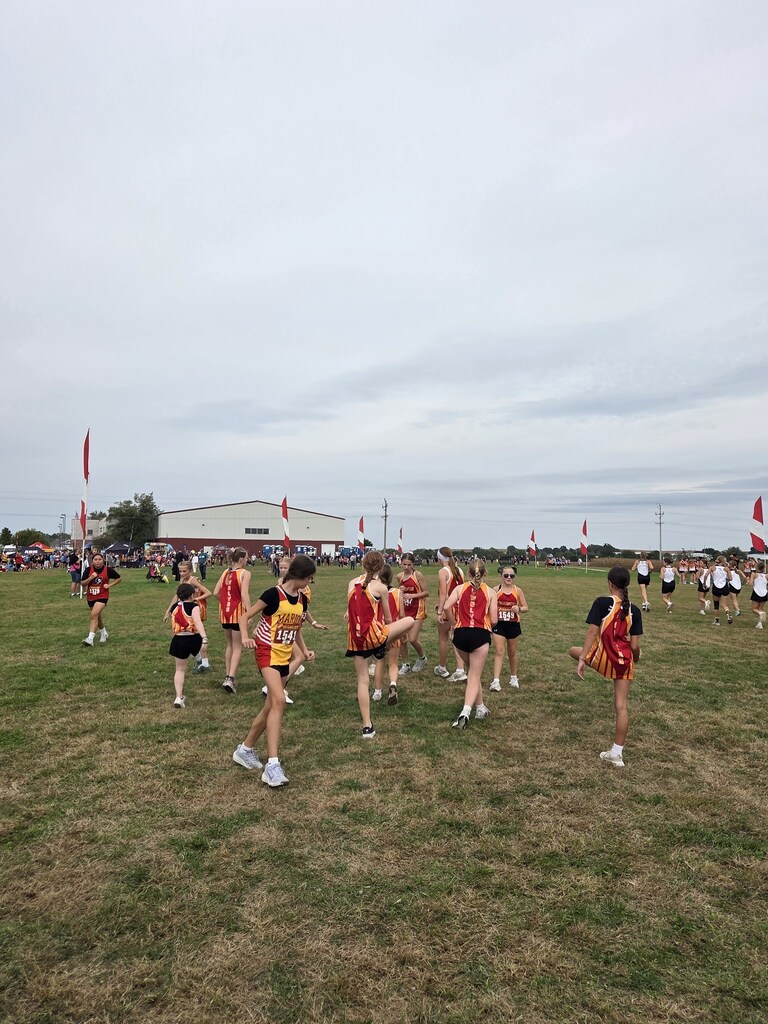 Girls Stretch before a VMS Cross Country race.