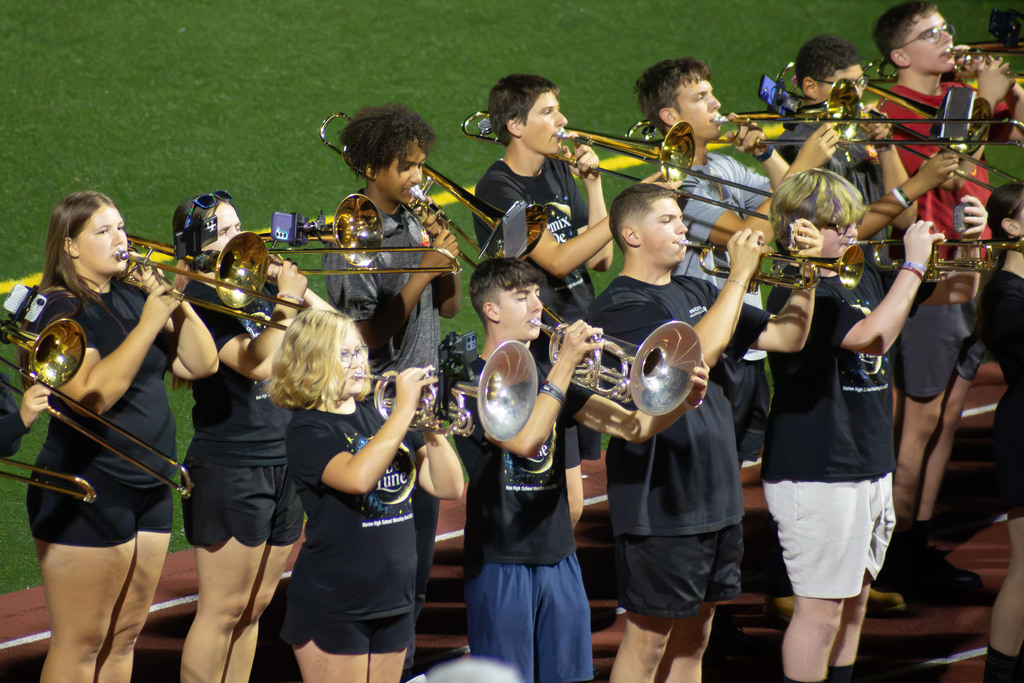 VMS 8th Grade Band performing with MHS Marching Band at MHS Football Game