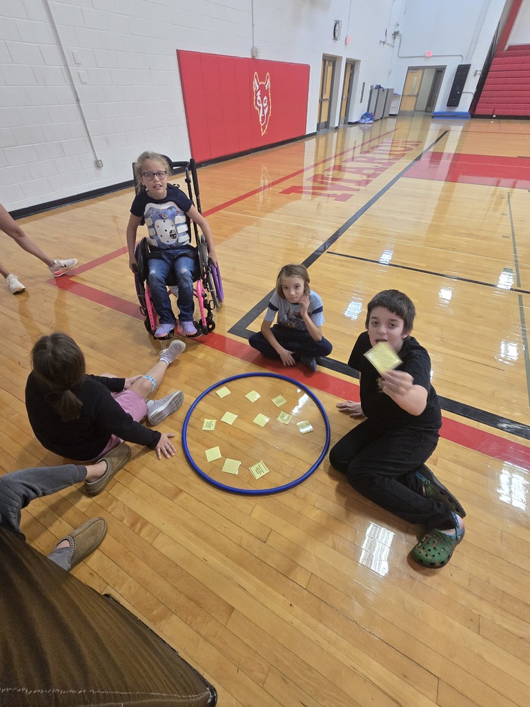 Adaptive PE students play CrAzy Card Game in Gym