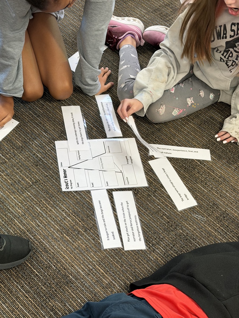 Students working on literacy sorting activity.