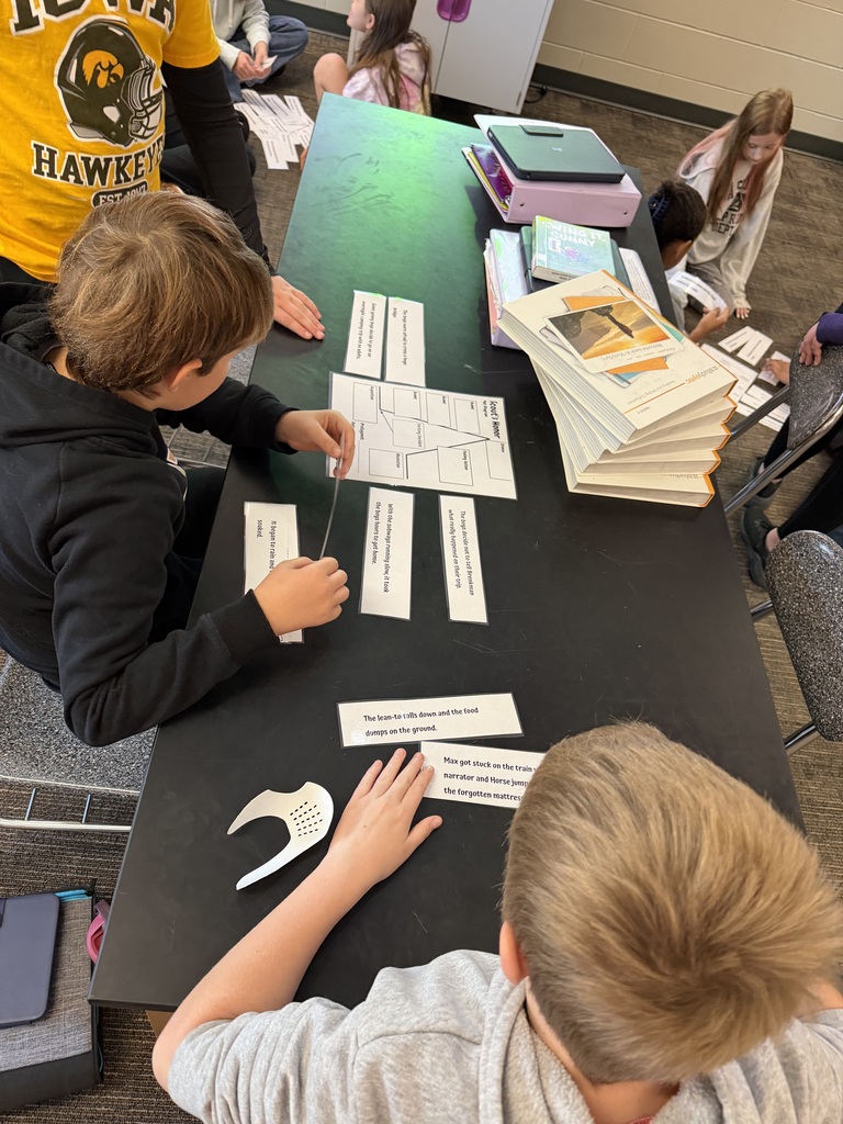 Students working on literacy sorting activity.