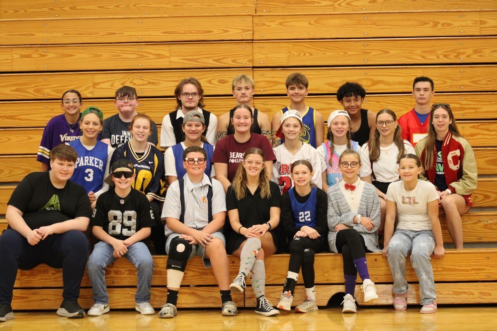 Students sitting on bleachers for homecoming