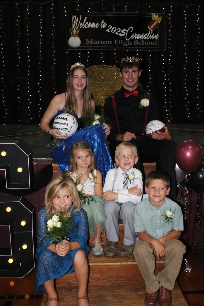 Homecoming king and queen with attendants