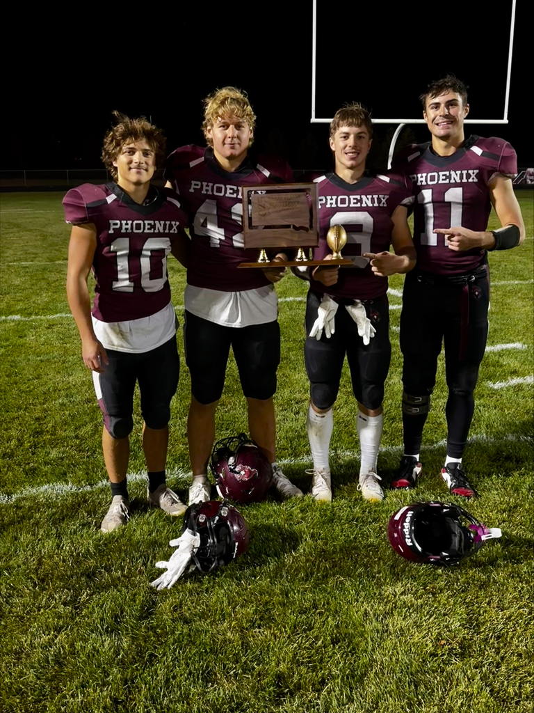 Marion Upper classman with the trophy.
