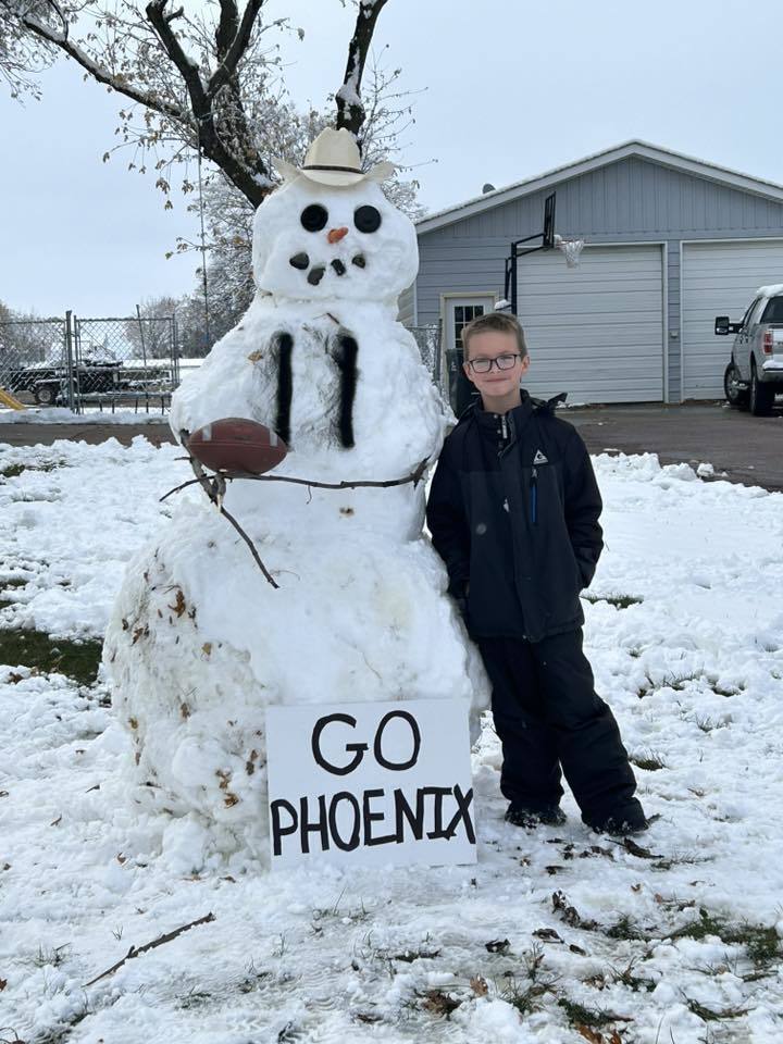1 boy with phoenix snowman
