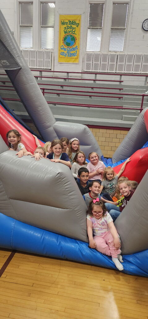 Kids on bounce house.