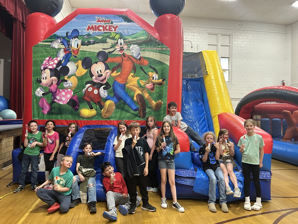 Kids on bounce house.