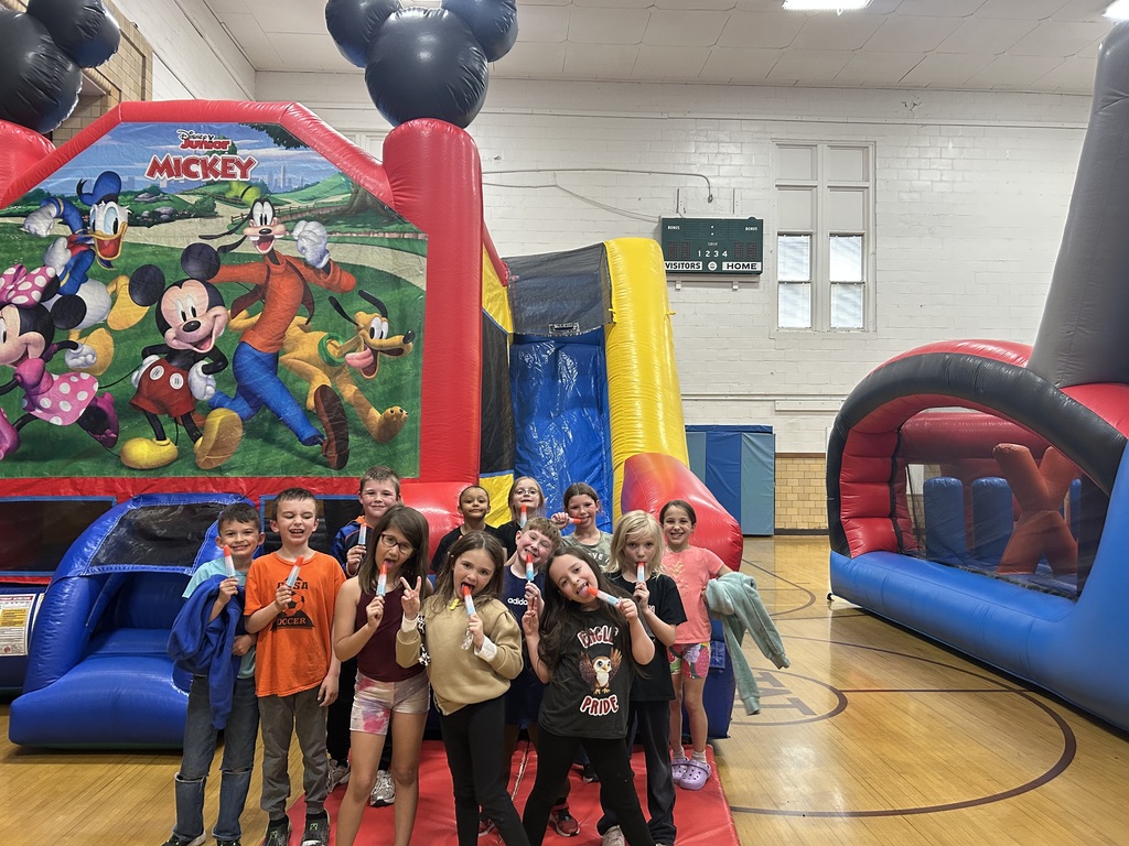 Kids on bounce house.