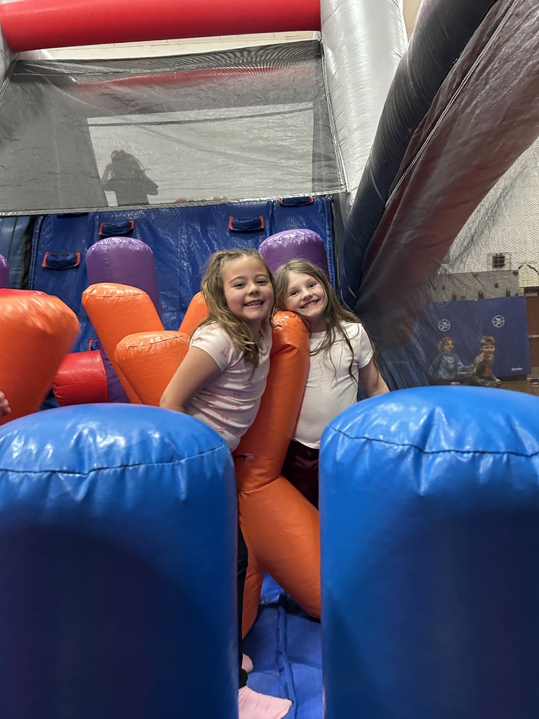 Kids on bounce house.