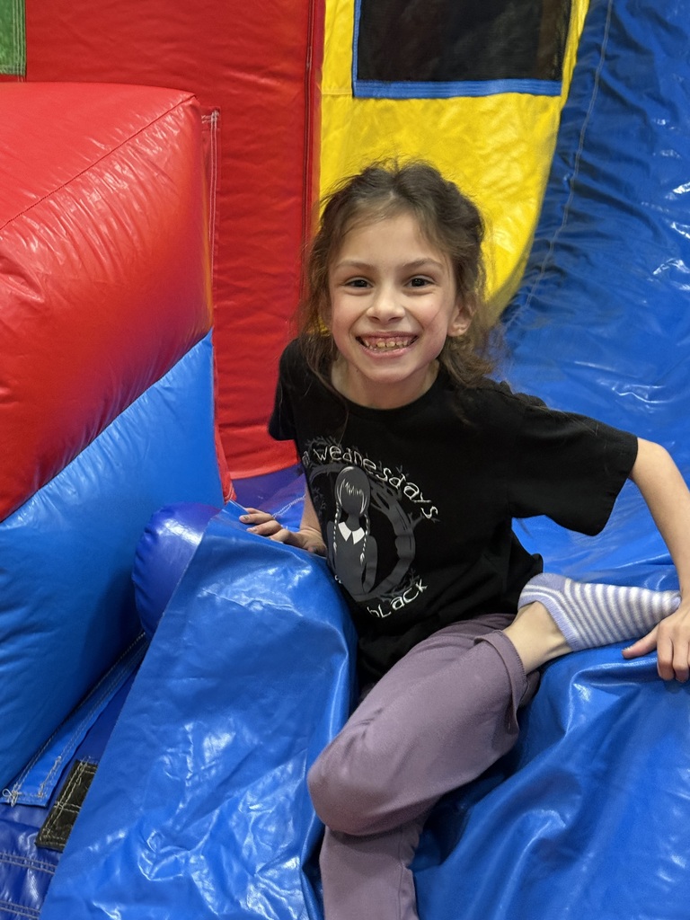 Kids on bounce house.