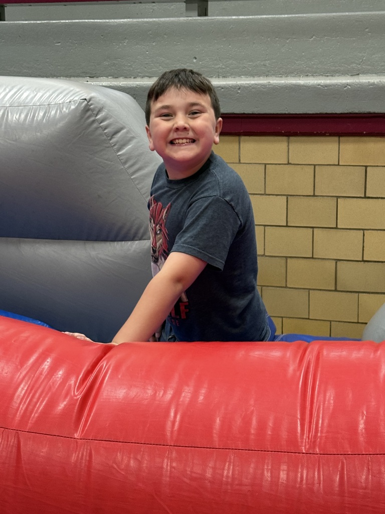 Kids on bounce house.