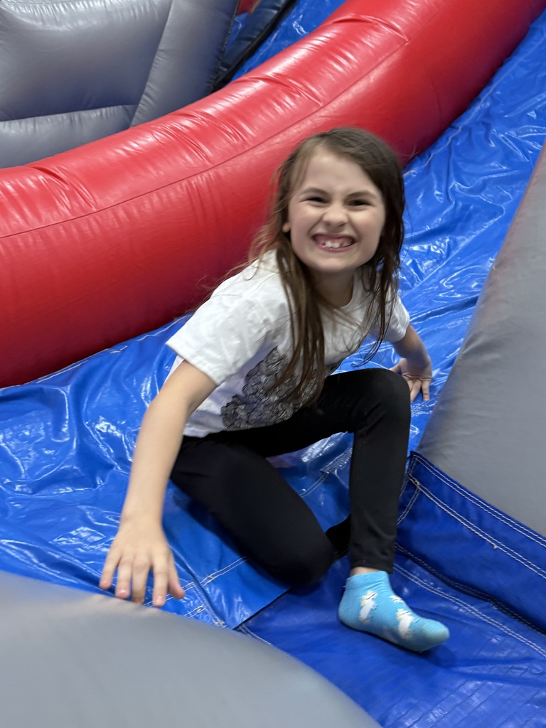 Kids on bounce house.