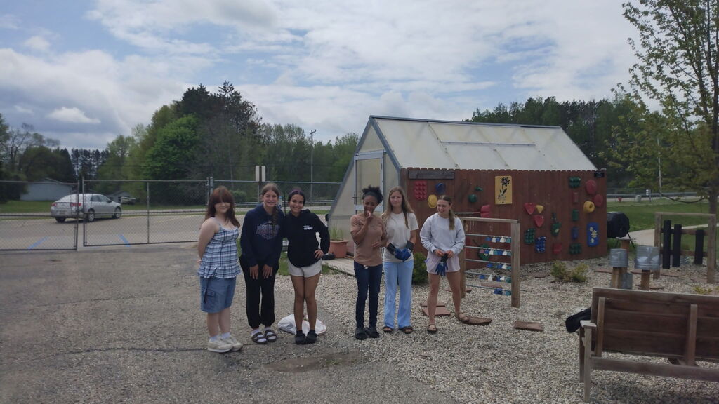 Students cleaning the elementary