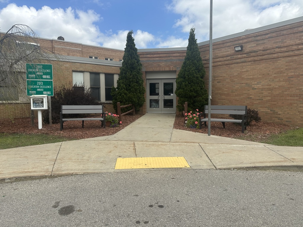 Students cleaning the elementary