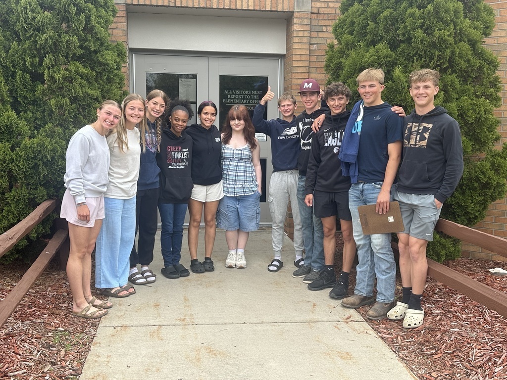 Students cleaning the elementary