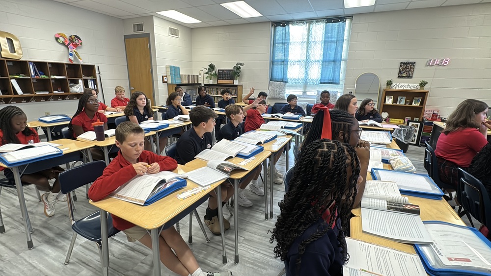 HCGC 6th graders engaged in Ms. Dennies' lesson