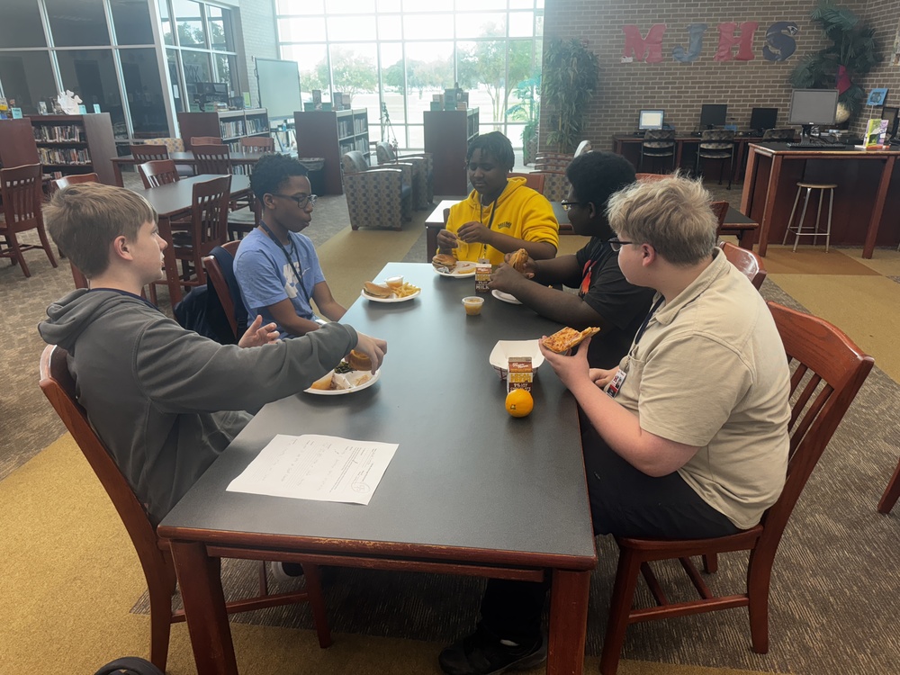 students attend mjhs lunch in the library