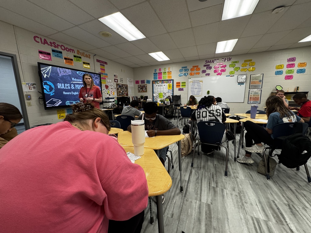 Students working in a 7th grade classroom