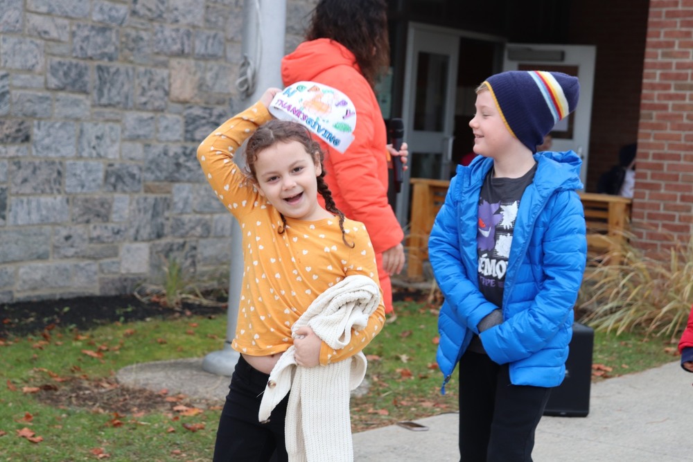 Two students walking outside