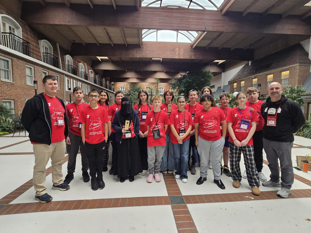 Group of students and advisors at conference