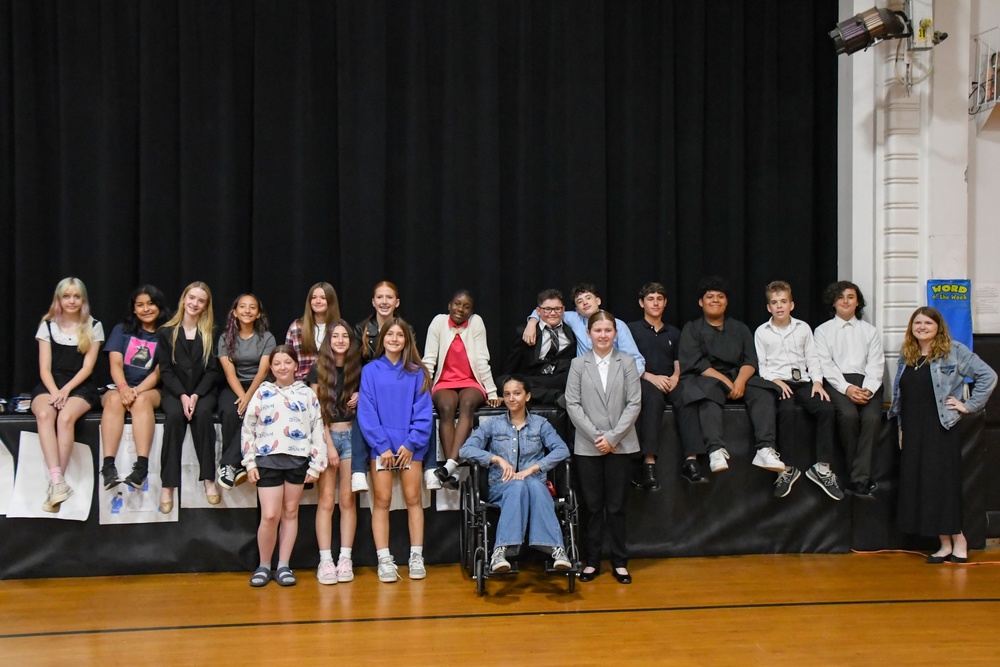 middle school students posing for a group photo