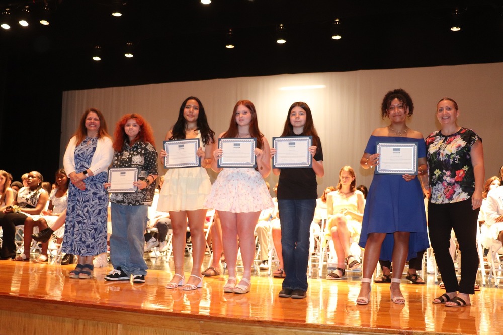 Scholarship winners on stage