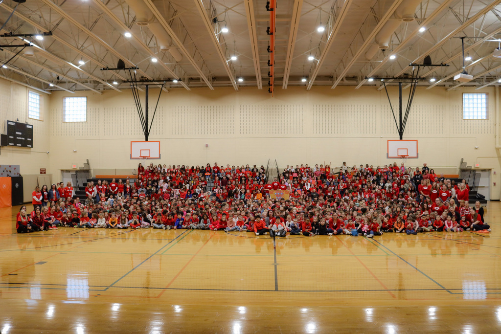 The student body wearing red