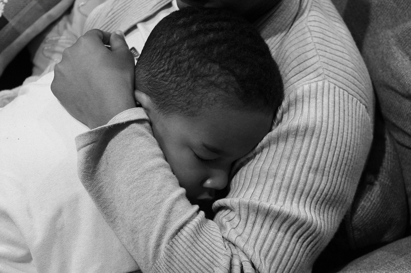 A photograph of a sleeping child