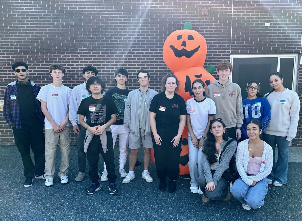 Marlborough High School's NHS volunteers take a group picture at this weekend's fall festival