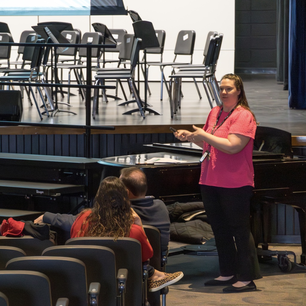 An MPS staff member presents to colleagues in the Whitcomb auditorium.