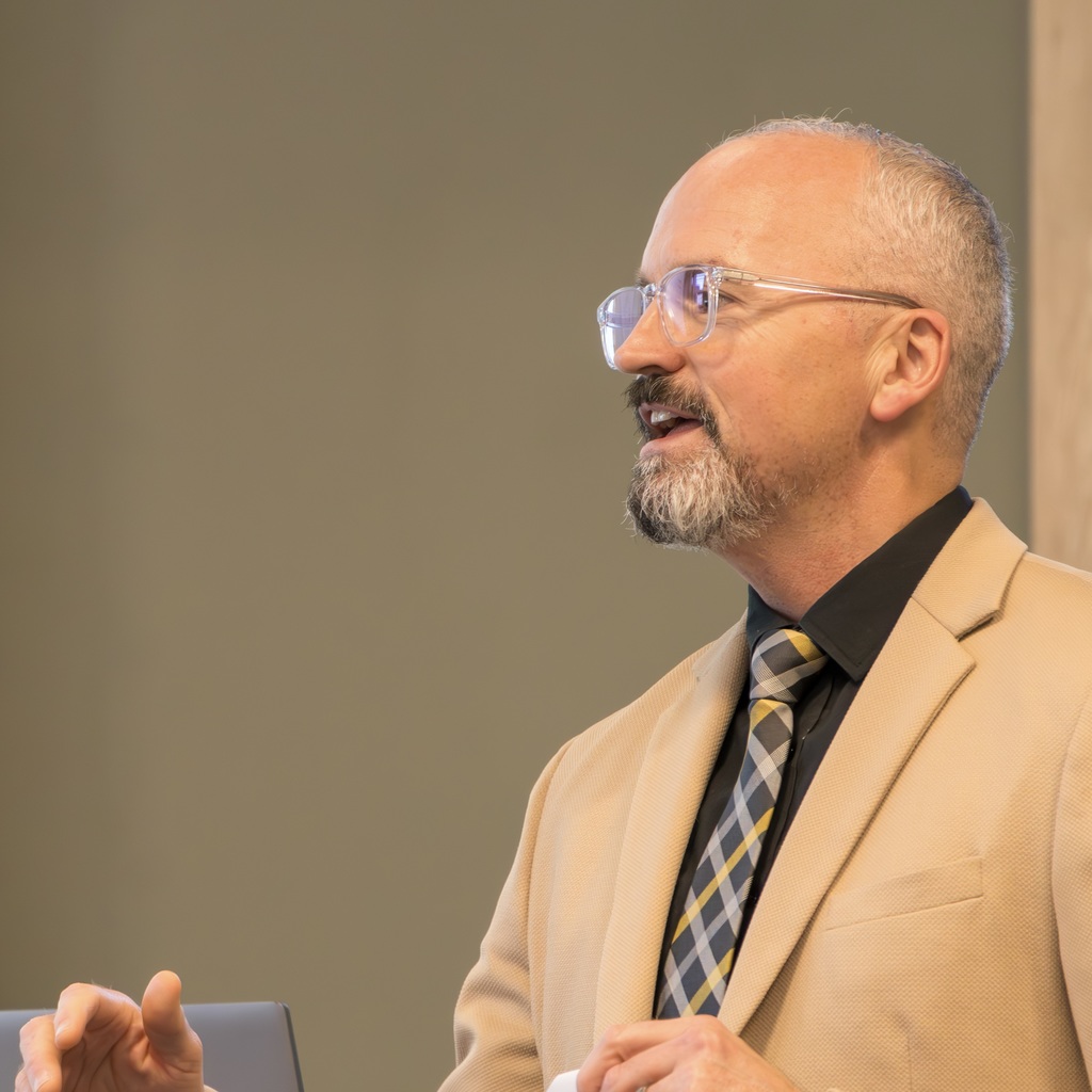 Interim Superintendent Jason DeFalco gives a presentation to the MEDC board.