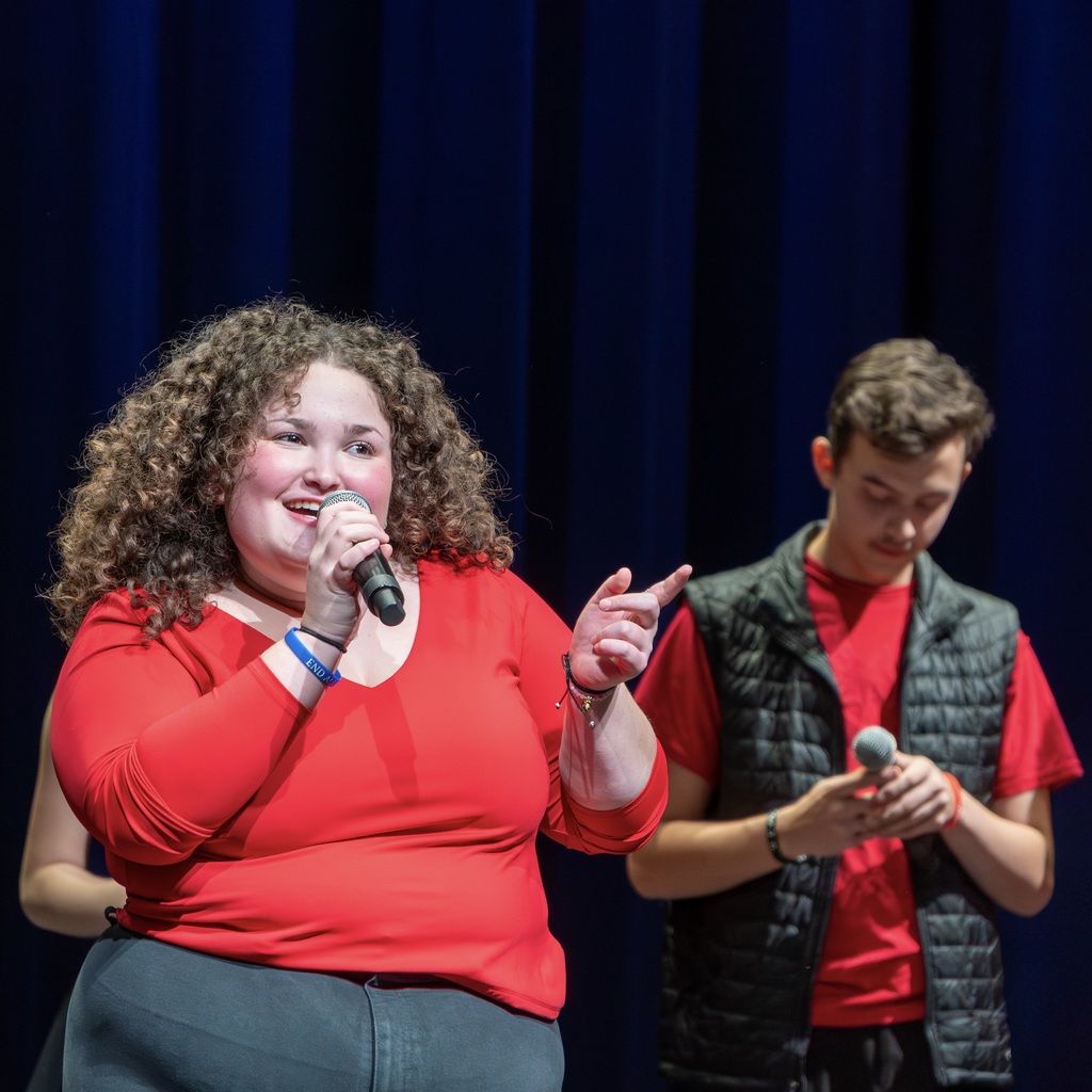 A Voices ReChoired female singer sings a solo.