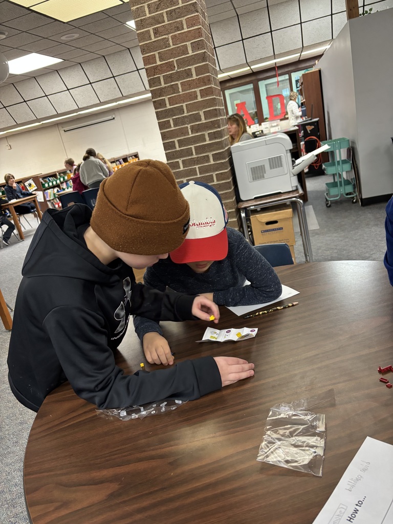 Fantin and Nickens team up to build legos with their kids