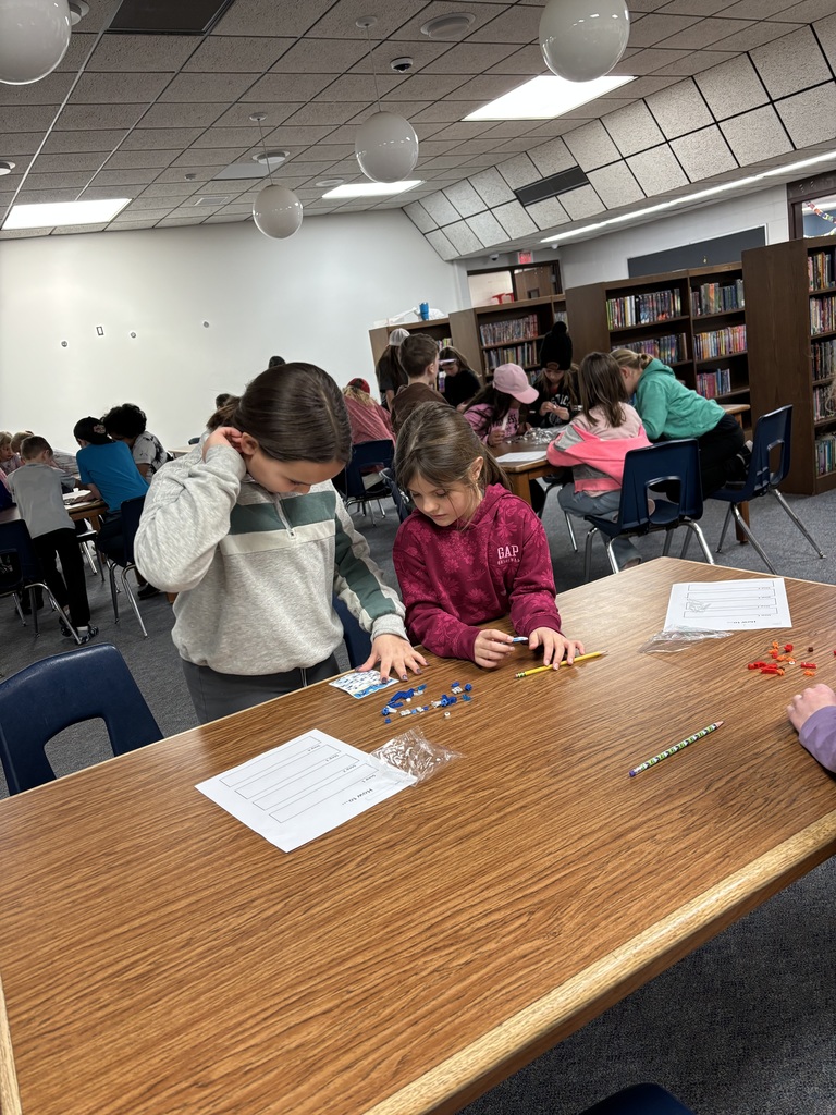 Fantin and Nickens team up to build legos with their kids