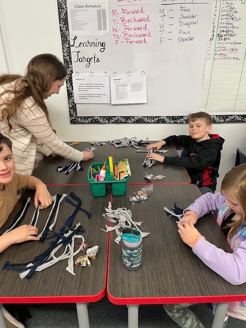 Mrs. Lundell's class making toys for animals