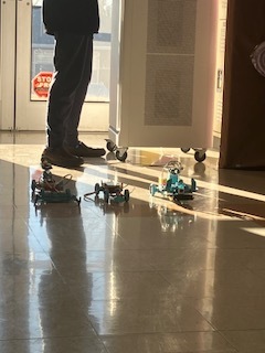 Students building robotic Legos