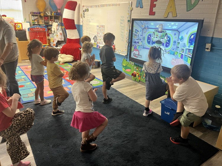Pre-K doing Yoga today! 