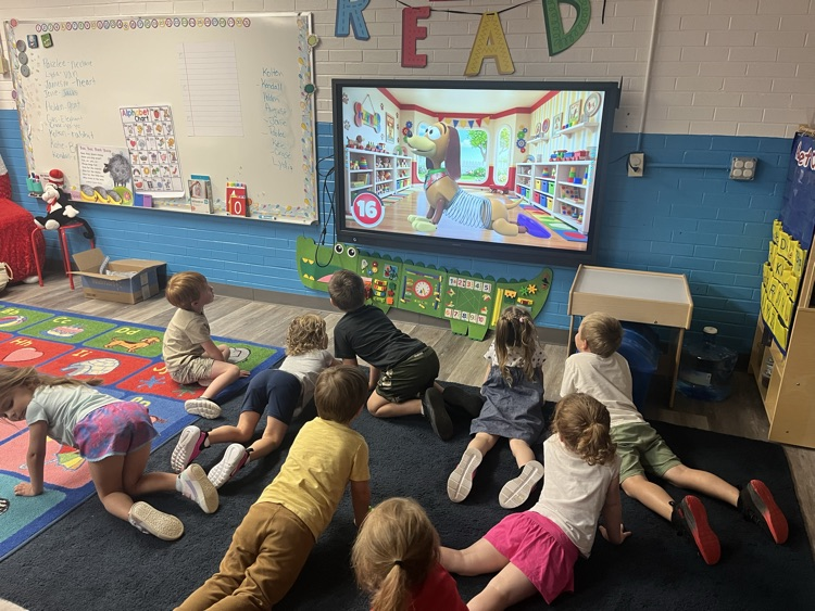 Pre-K doing Yoga today! 