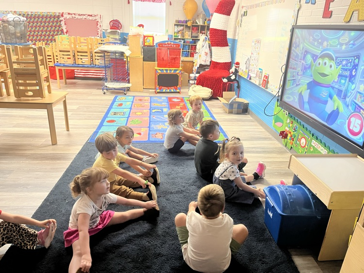 Pre-K doing Yoga today! 