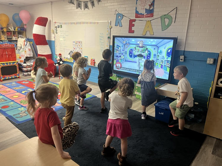 Pre-K doing Yoga today! 