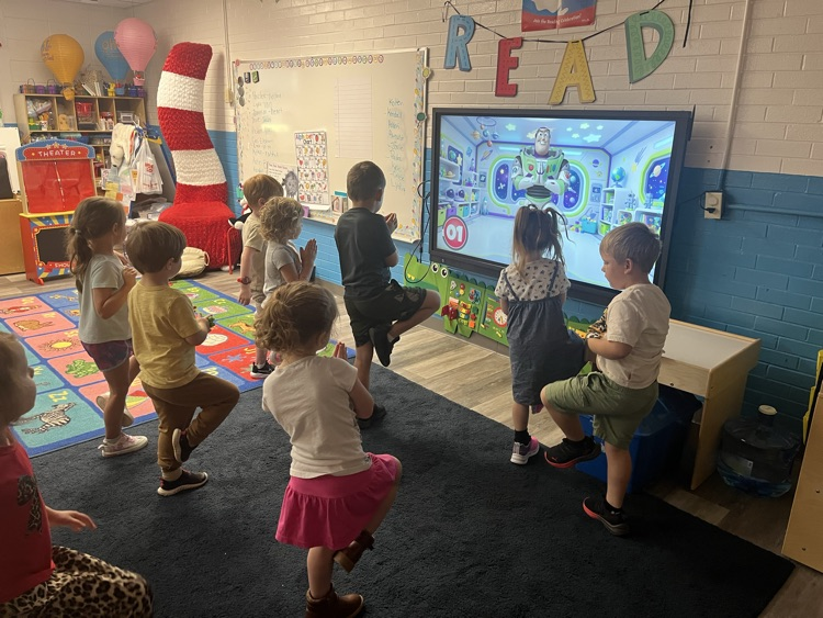 Pre-K doing Yoga today! 