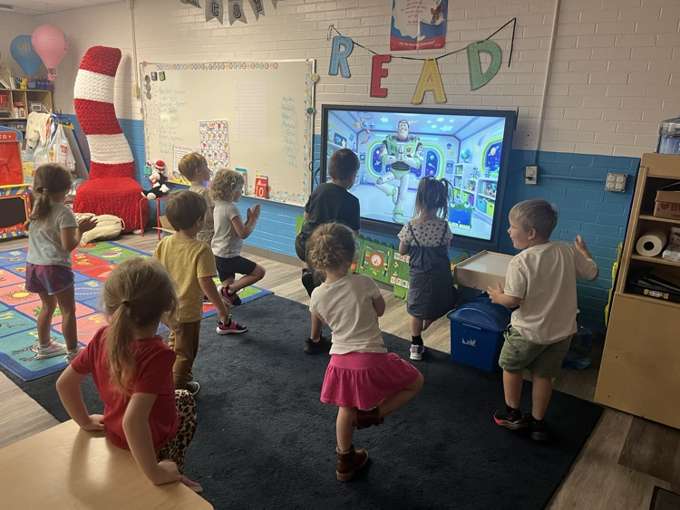 Pre-K doing Yoga today! 