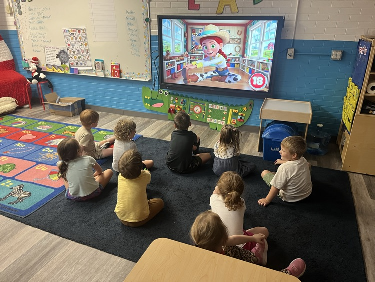 Pre-K doing Yoga today! 