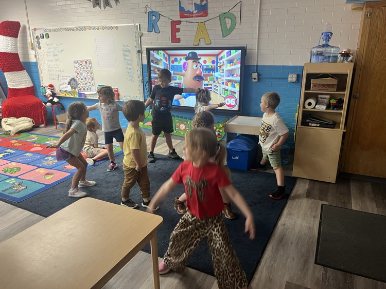 Pre-K doing Yoga today! 