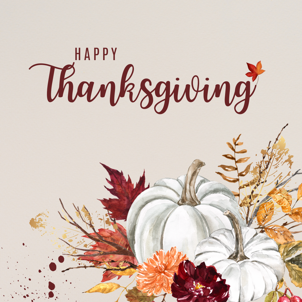 white pumpkins and fall leaves on a tan background, red text reads "happy thanksgiving"