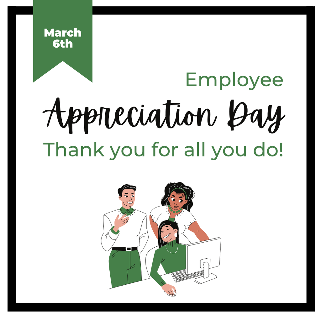 employees standing around a woman working at a computer