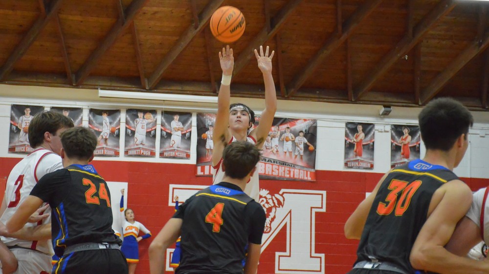 Payton McGuire goes up for 3 of his career high 40 points